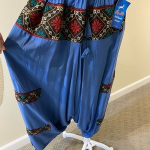 NWT blue embroidered Aladdin pants
One size fits most